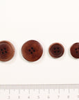 Corozo button with engraved edge