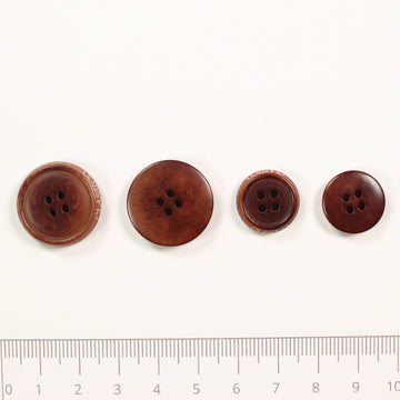Corozo button with engraved edge